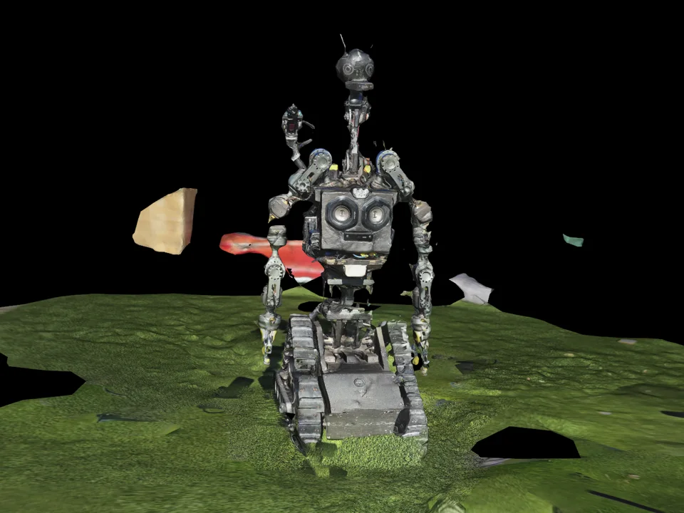 3D scan of ROB with twin chest speakers, a long camera neck, articulated arms and triangular treads